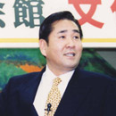 顔写真：辻本一英さん