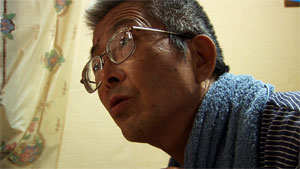 写真：映画撮影の様子写真：今中さん顔のアップ
