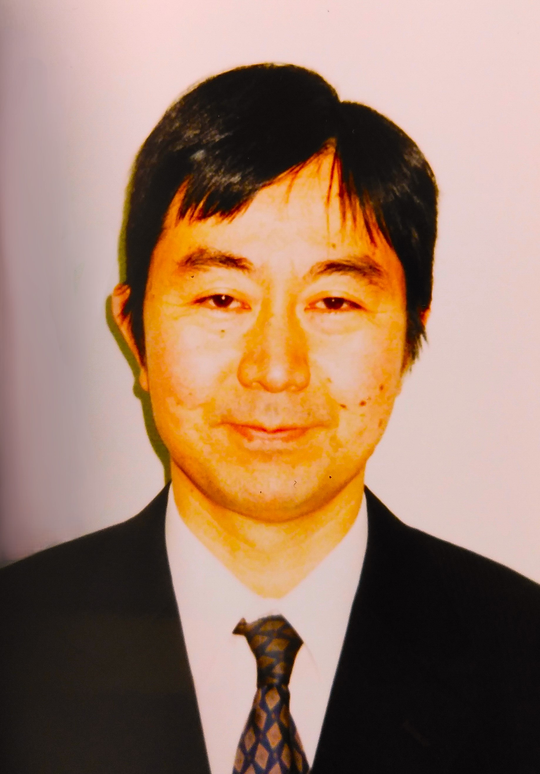 村岡教昭氏顔写真